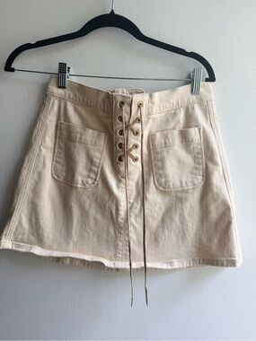 Lace-Up Front y2k Mini Skirt in Cream